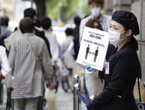 Japan more likely to completely end state of emergency on Monday